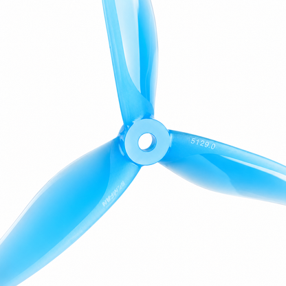 Close-up of 5129 YUKI Sea Blue PC 3 Blade Drone Propeller showing center hub and aerodynamic blade design