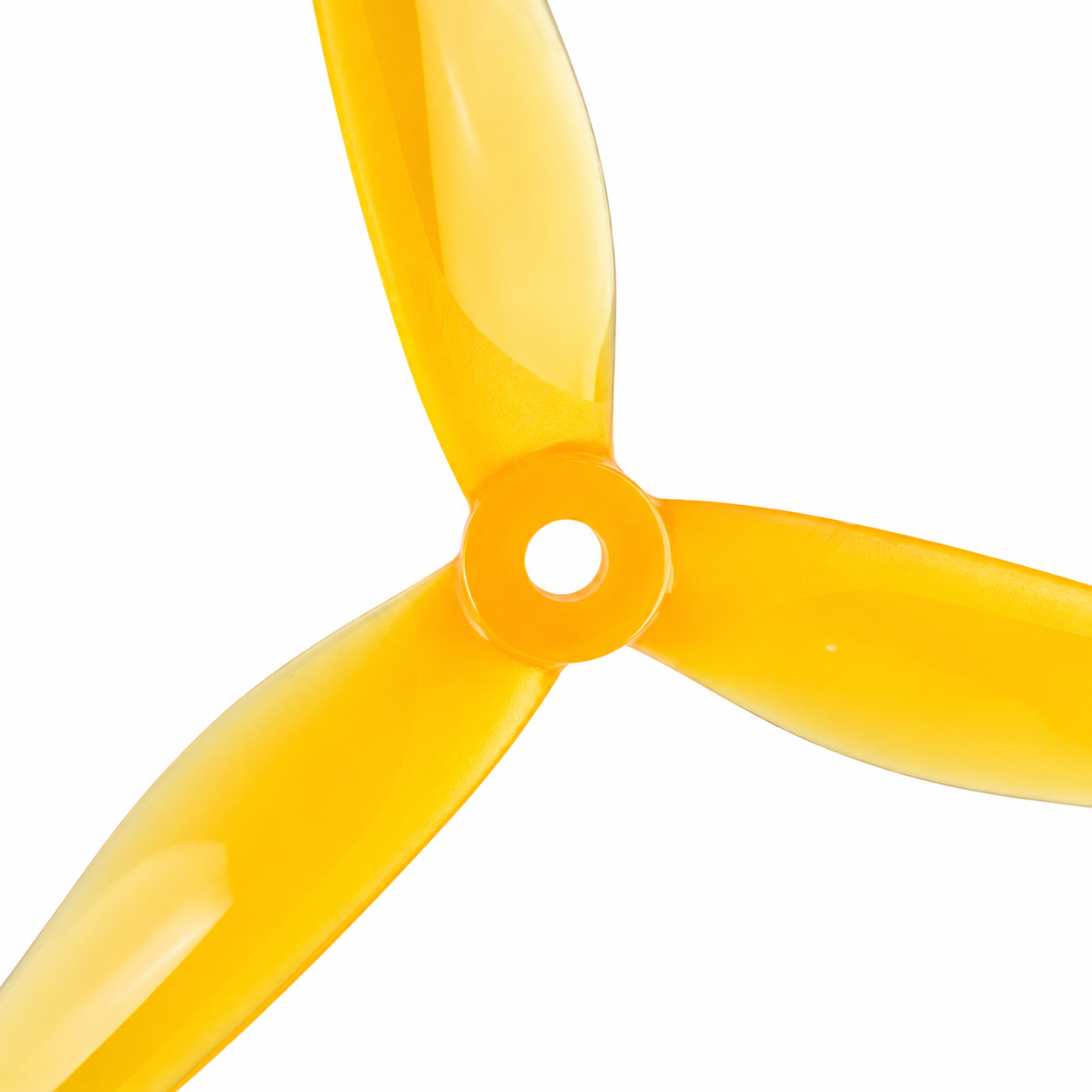 Close-up of 5129 YUKI Yellow PC 3 Blade Drone Propeller showing center hub and aerodynamic blade design