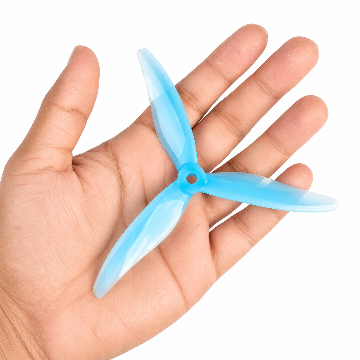 5129 YUKI Sea Blue Drone Propeller held in hand
