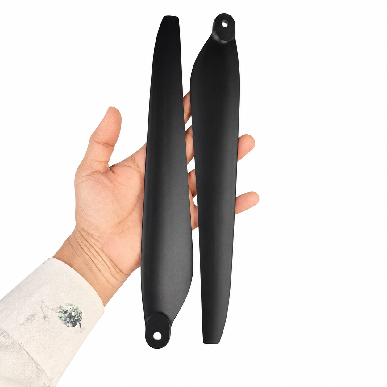 Hobbywing X6 Plus 2480 Folding Propeller Without Hub CCW Held in Hand