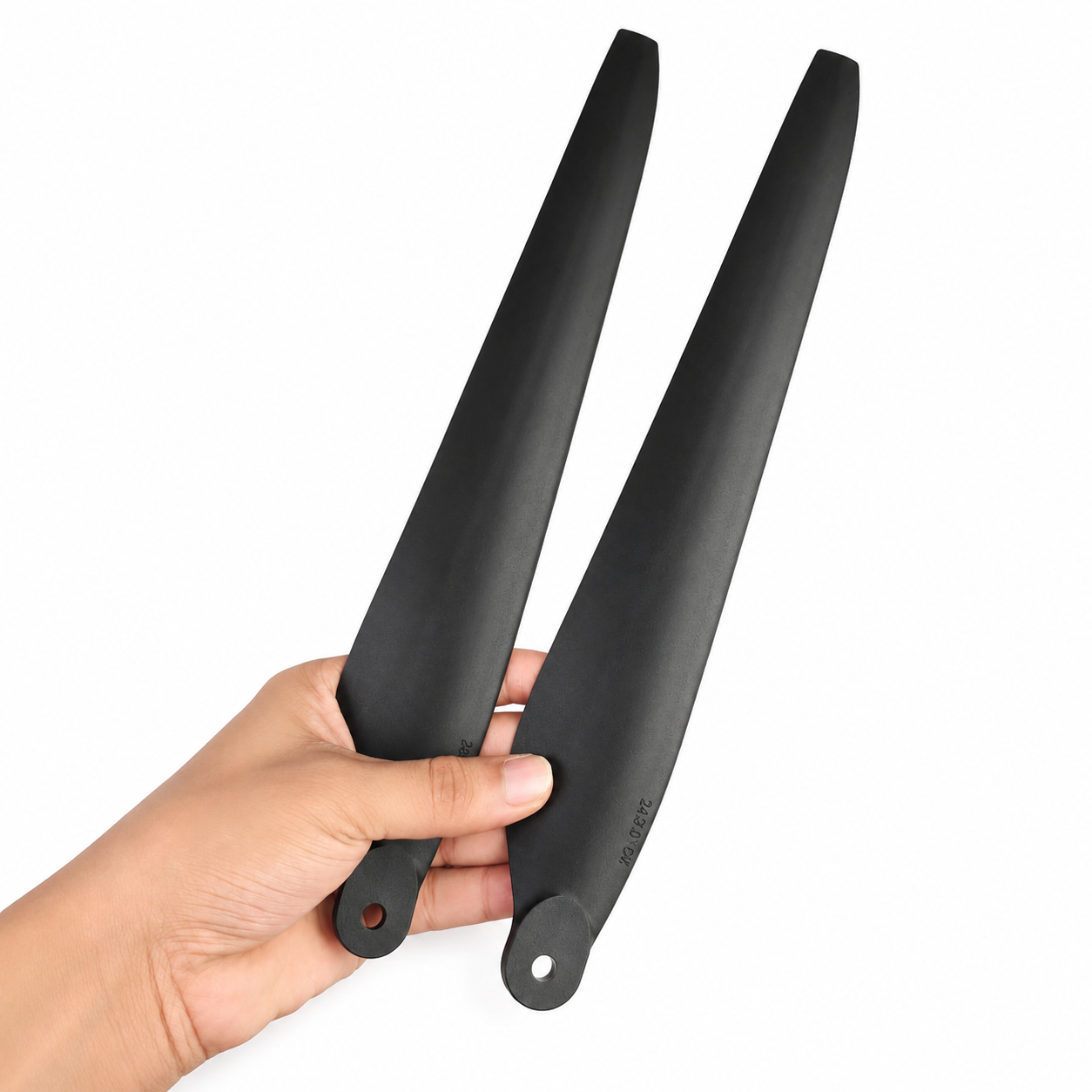 Hobbywing X6 Plus 2480 Folding Propeller Held in Hand Showing Actual Size
