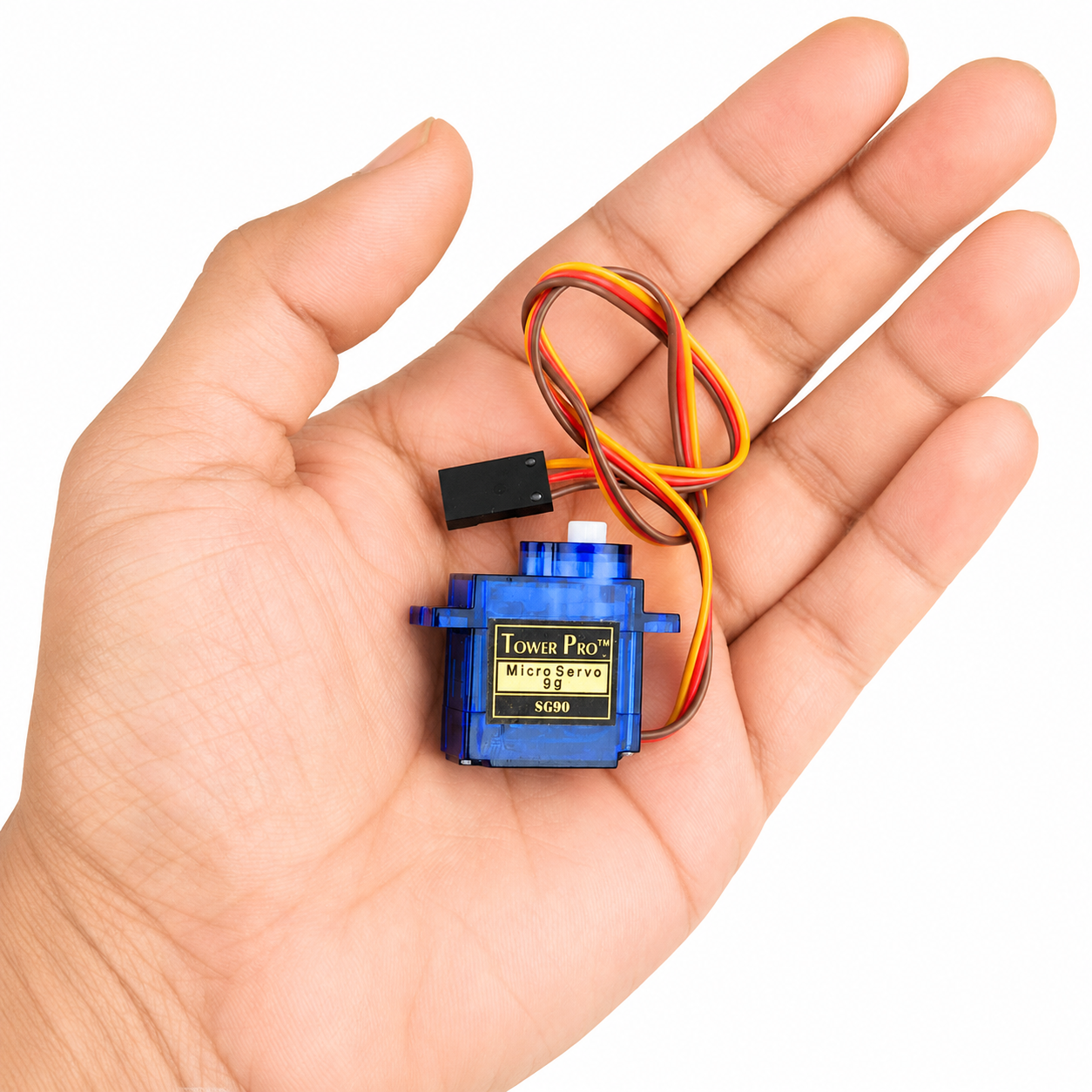 Compact Tower Pro SG90 9g Servo Motor Shown in Hand for Size Reference