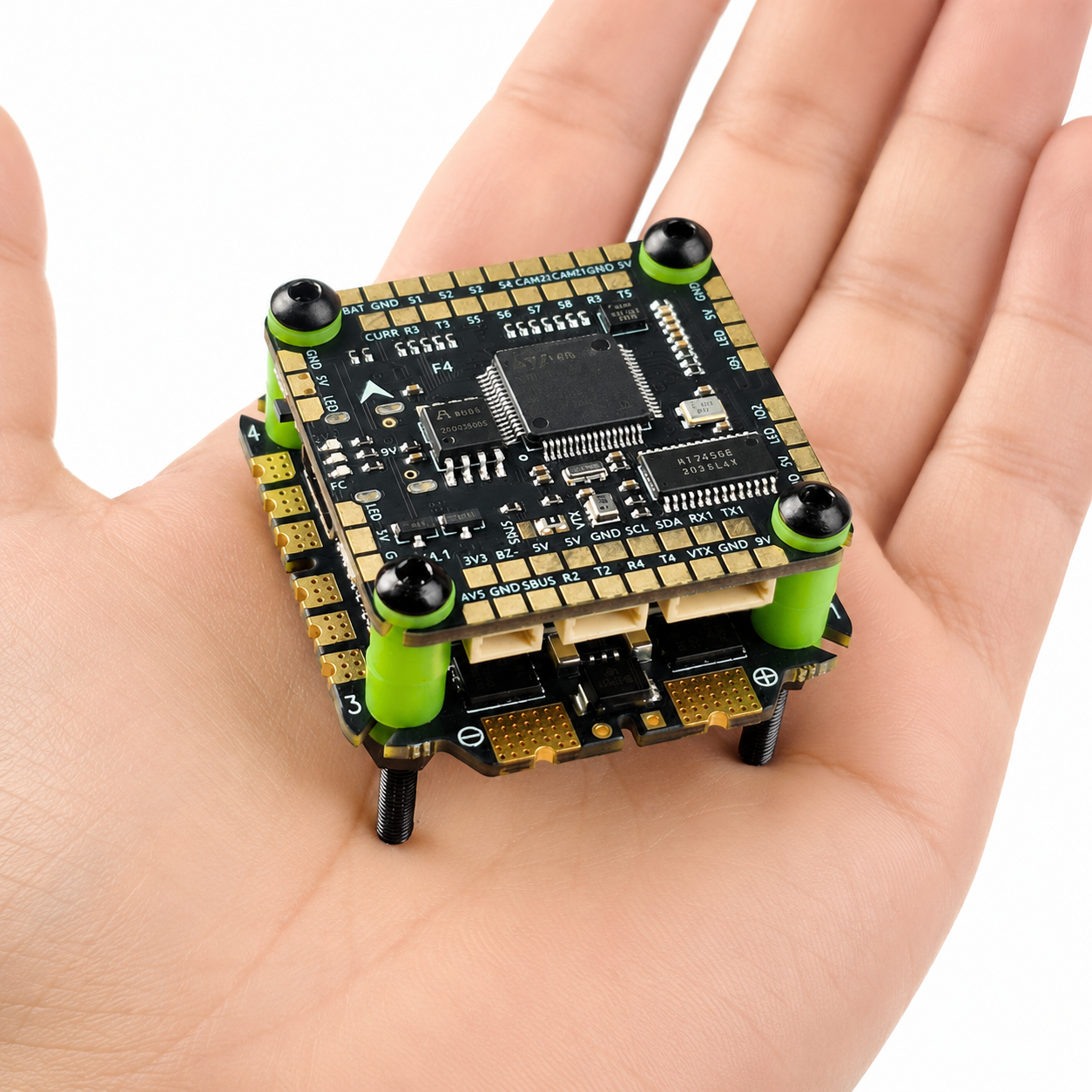 Aocoda RC F405 65A V4 8Bit Stack Held in Hand Showing Compact Size