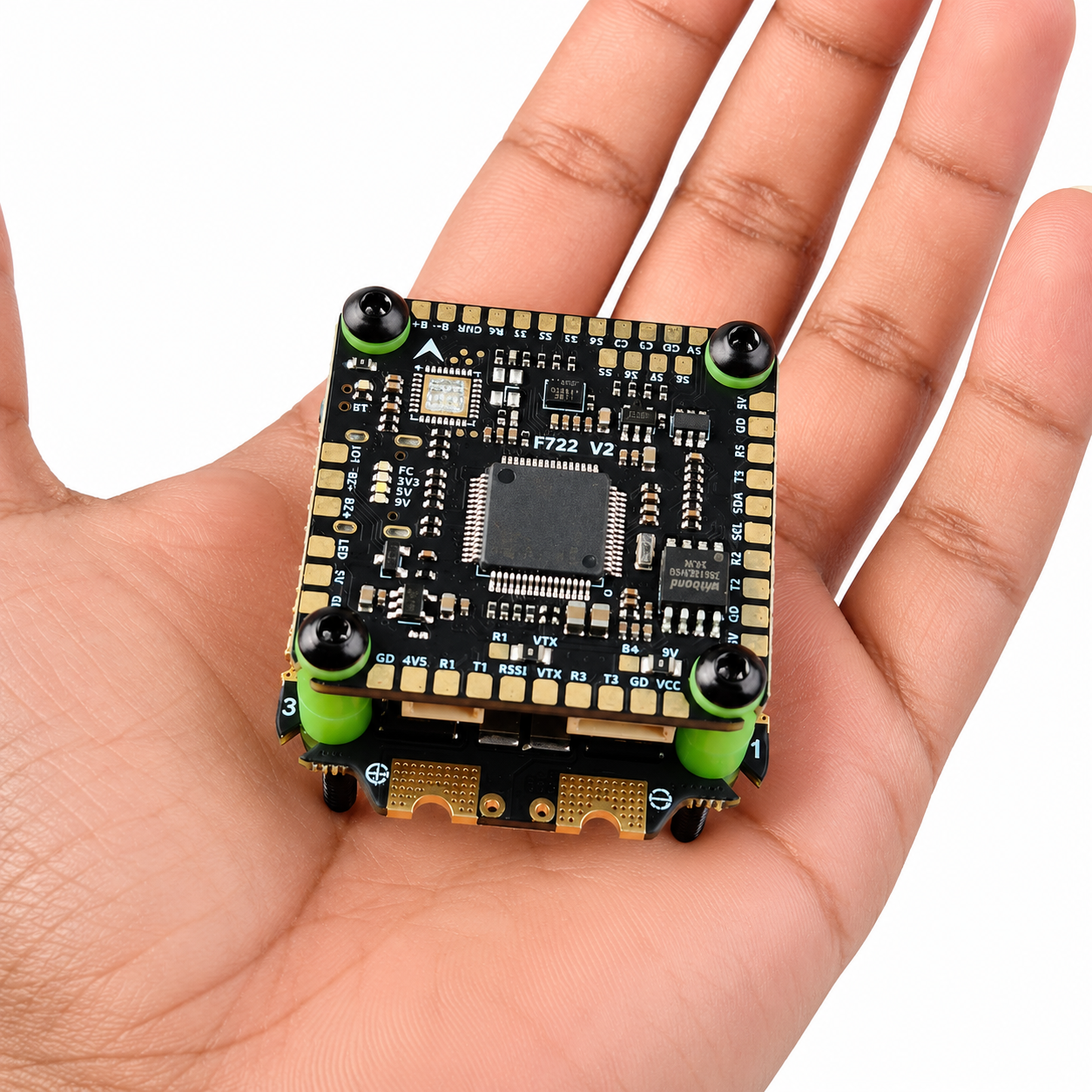 Hand Holding Aocoda-RC F722 V2 FC Stack with 55A 3055S ESC for Size Reference