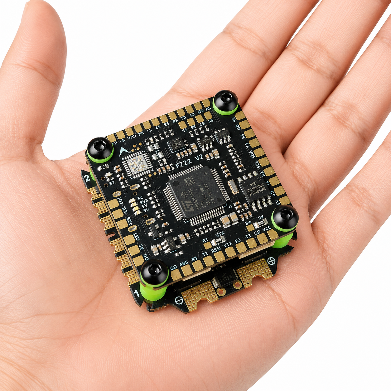 Hand Holding Aocoda-RC F765S V2 FC Stack with 65A 3065S ESC for Size Reference