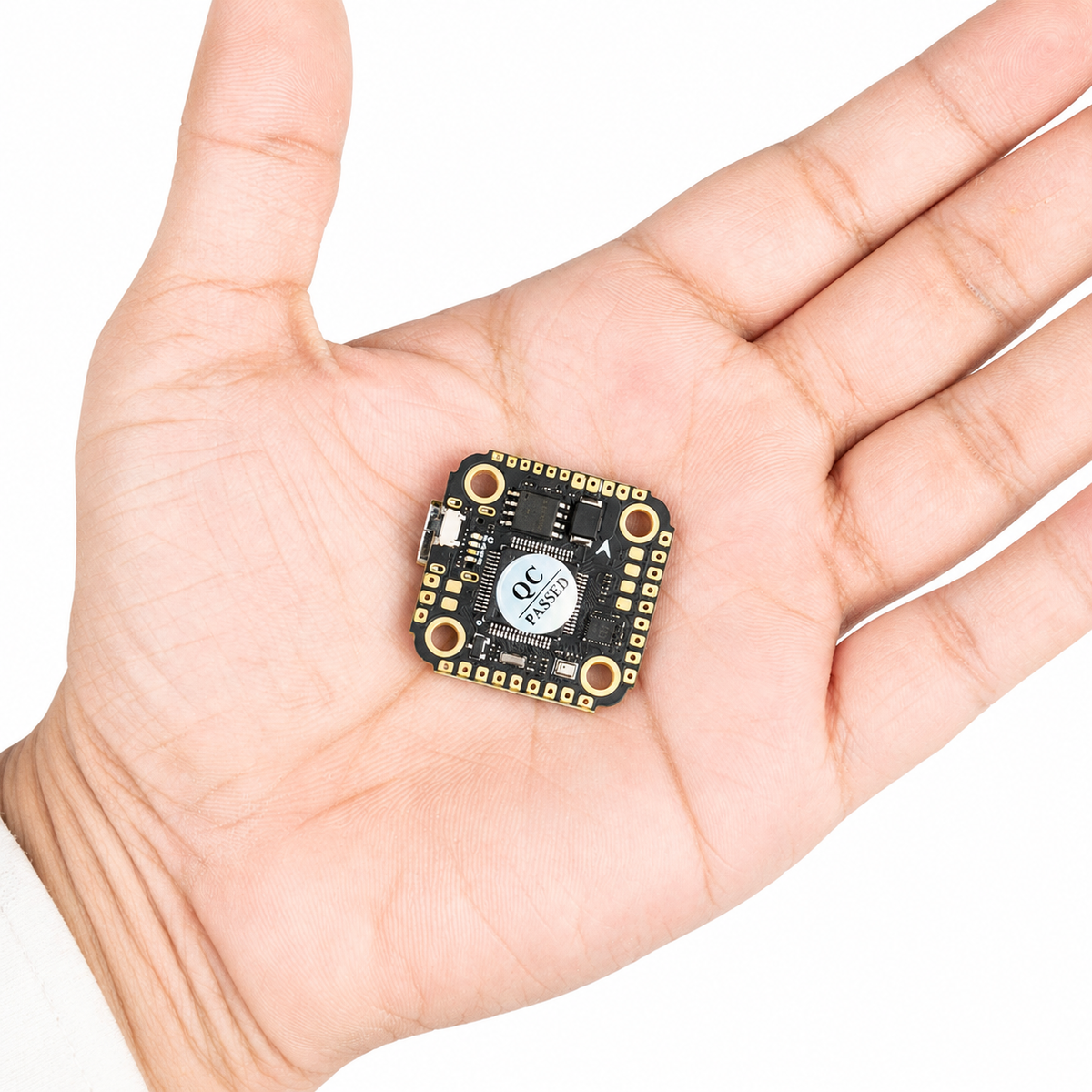 AocodaRC F7 Mini V1.0 Flight Controller size comparison