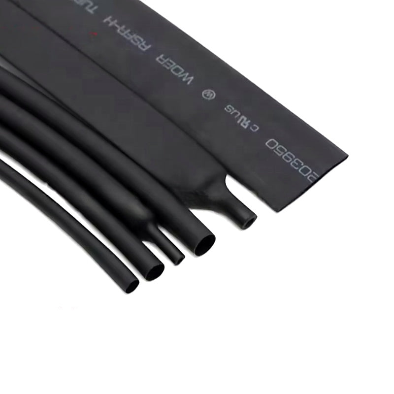 Cut pieces of black heat shrink tubing for wire insulation and cable repair