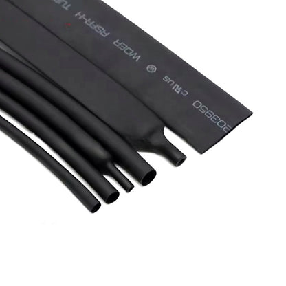 Cut pieces of black heat shrink tubing for wire insulation and cable repair