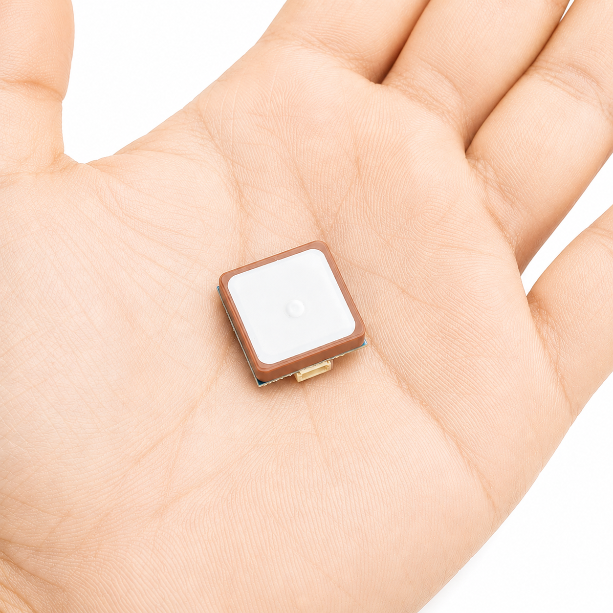 Back view of BZGNSS BZ-181 M10 GPS Module shown in hand for size reference, featuring ceramic GNSS antenna for FPV drones and UAVs