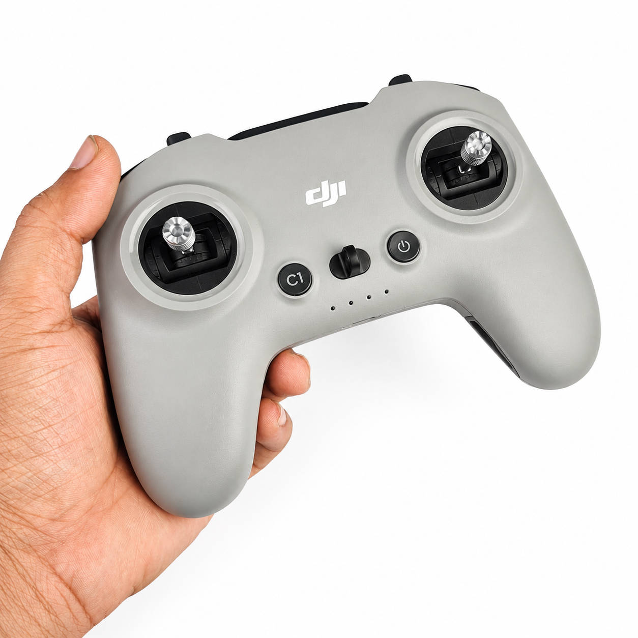 DJI FPV Remote Controller 3 shown in hand for size reference
