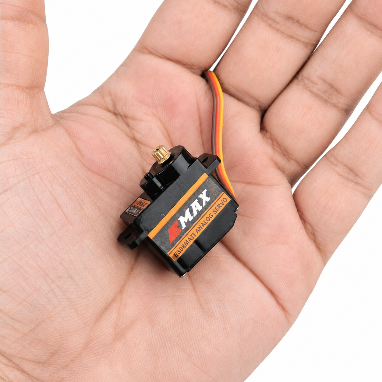Emax ES08MA II servo shown in hand for size comparison