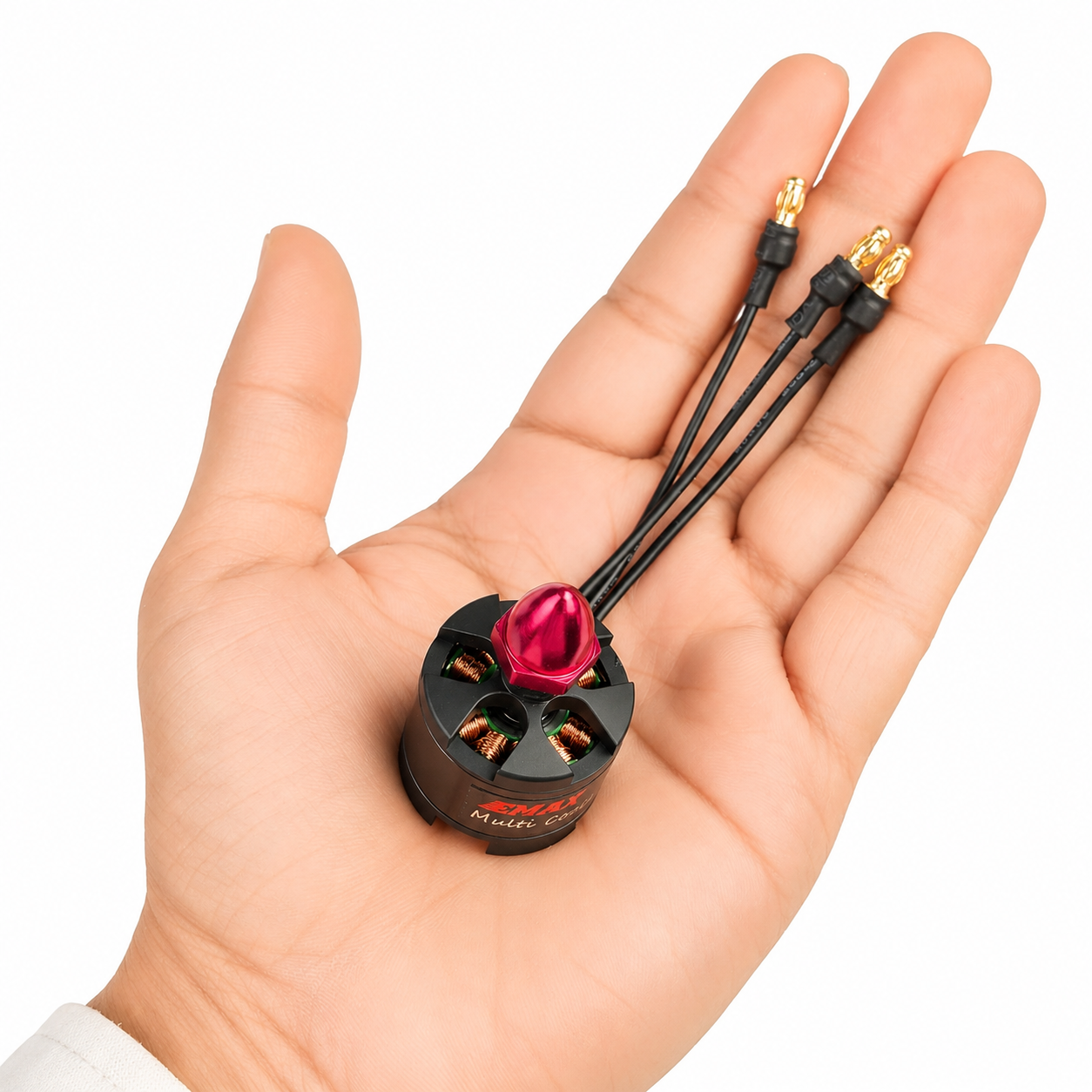 EMAX MT2213 935KV motor shown in hand for size comparison