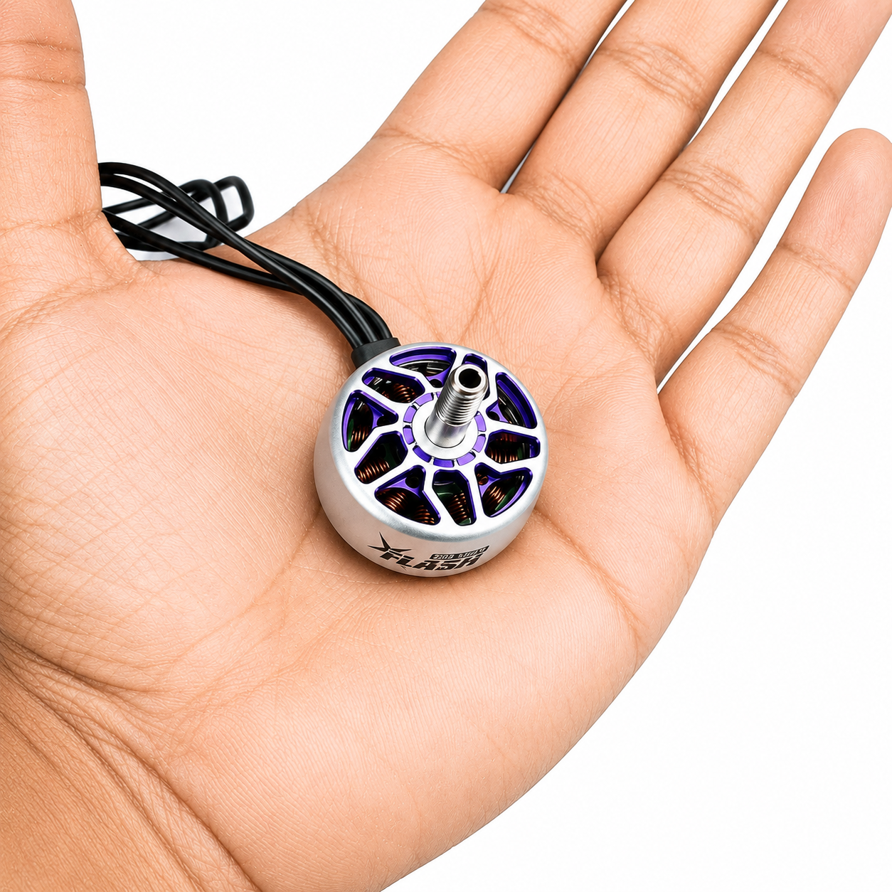 FlyFishRC Flash 2207 1850KV motor shown in hand for size reference