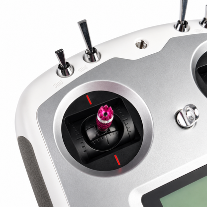 Close-up of FlySky FS-i6S control gimbal and switch assembly