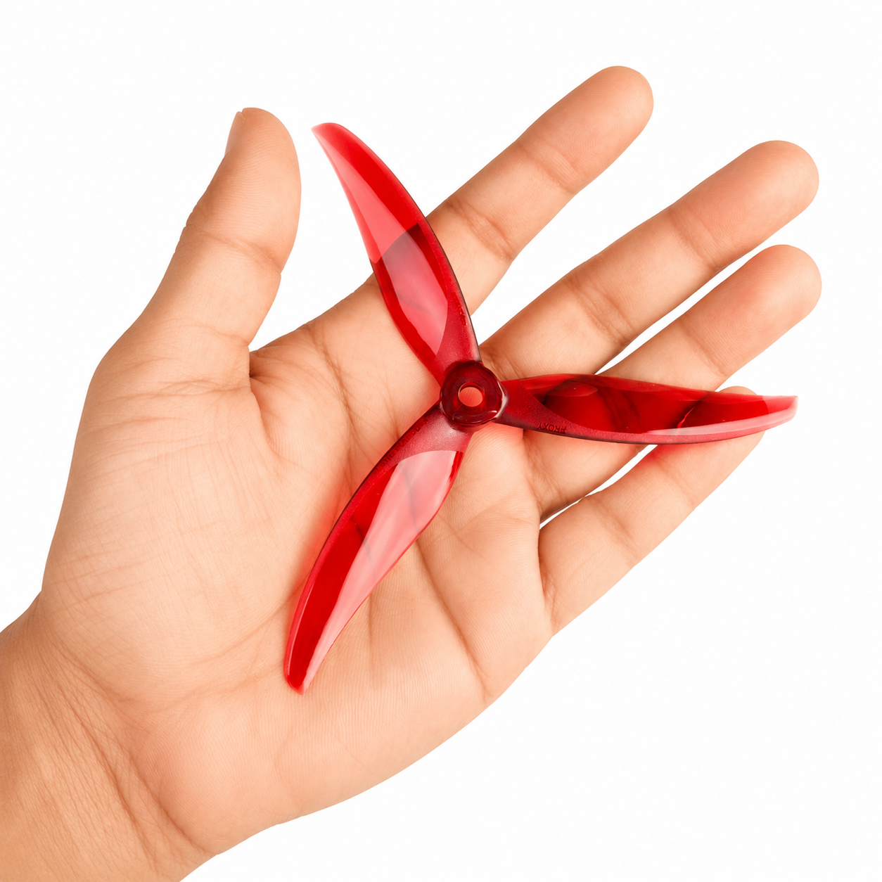  Gemfan 5127.5 Proxy Phoenix Red Drone Propeller held in hand
