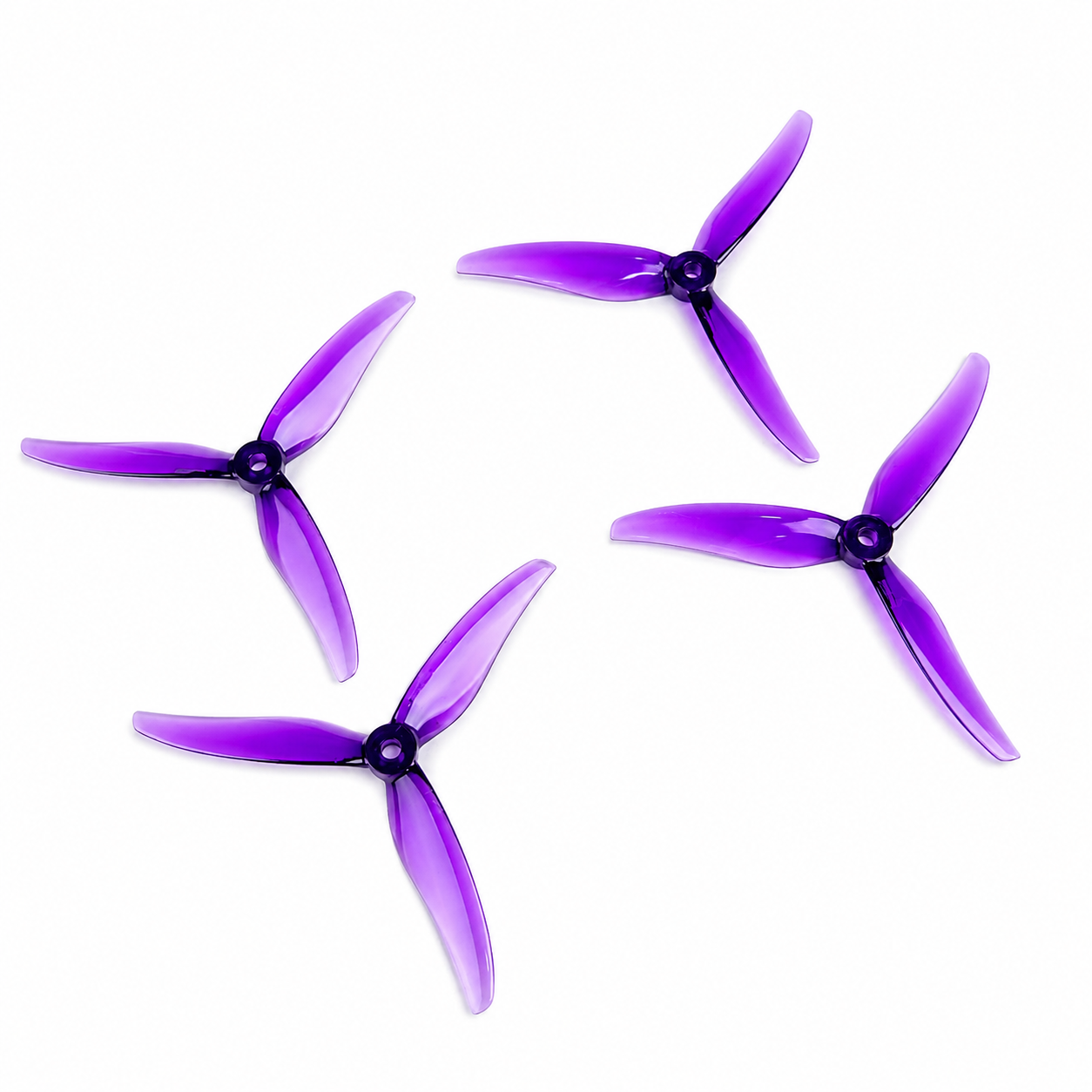 Four Gemfan 5131.0 Fury PC 3 Blade Purple FPV Drone Propellers (2CW+2CCW) arranged on a white background