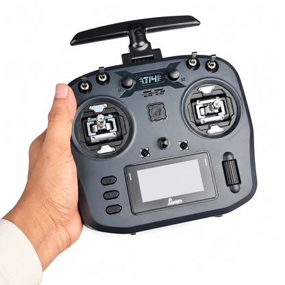 Jumper T14 radio controller shown in hand for size comparison