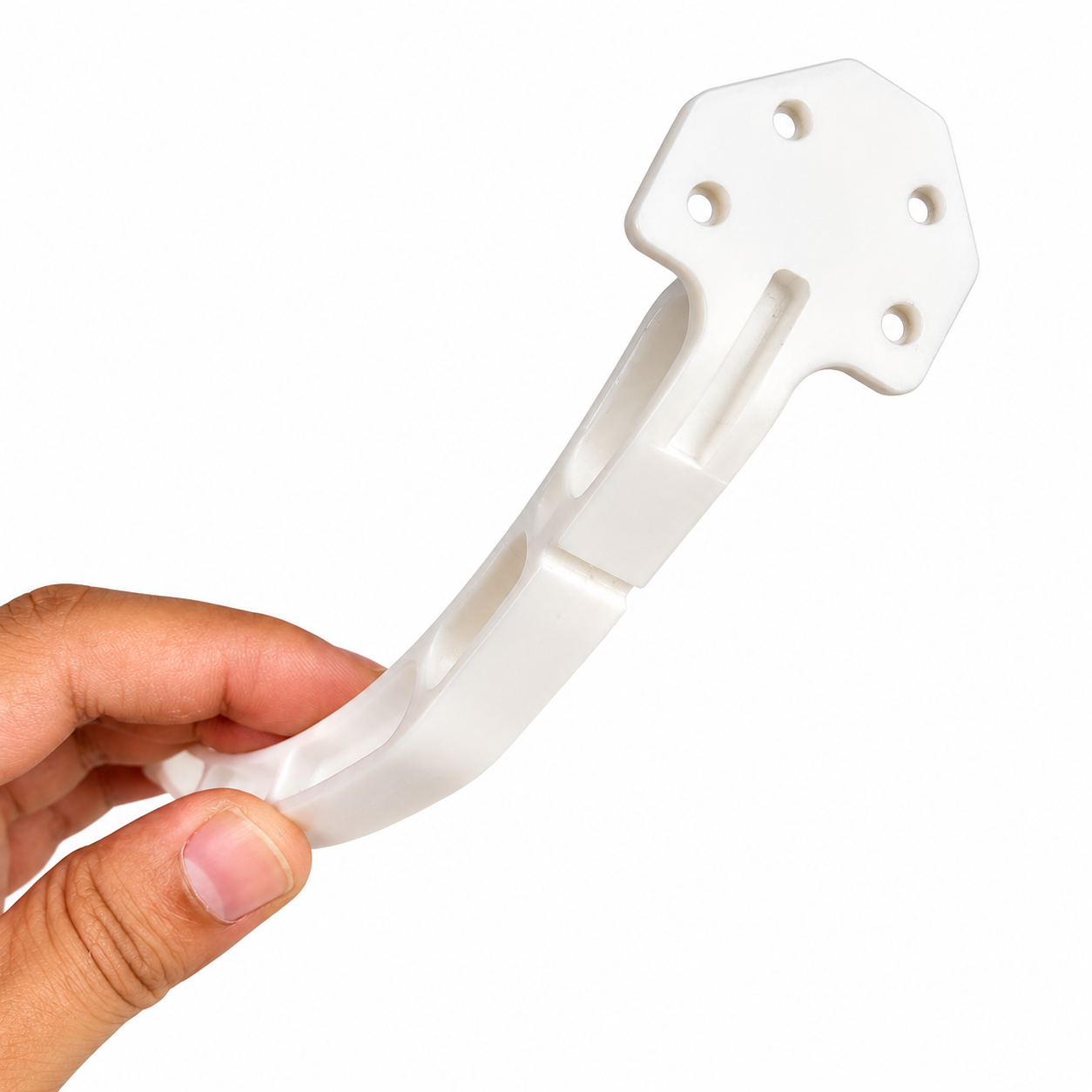 Close-up of white plastic landing gear with mounting holes