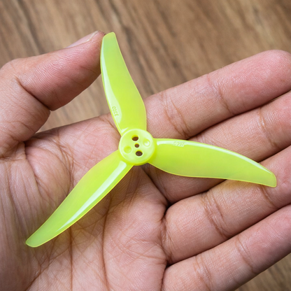 Close-up of Orange HD 3016 Lemon Yellow Propeller in hand