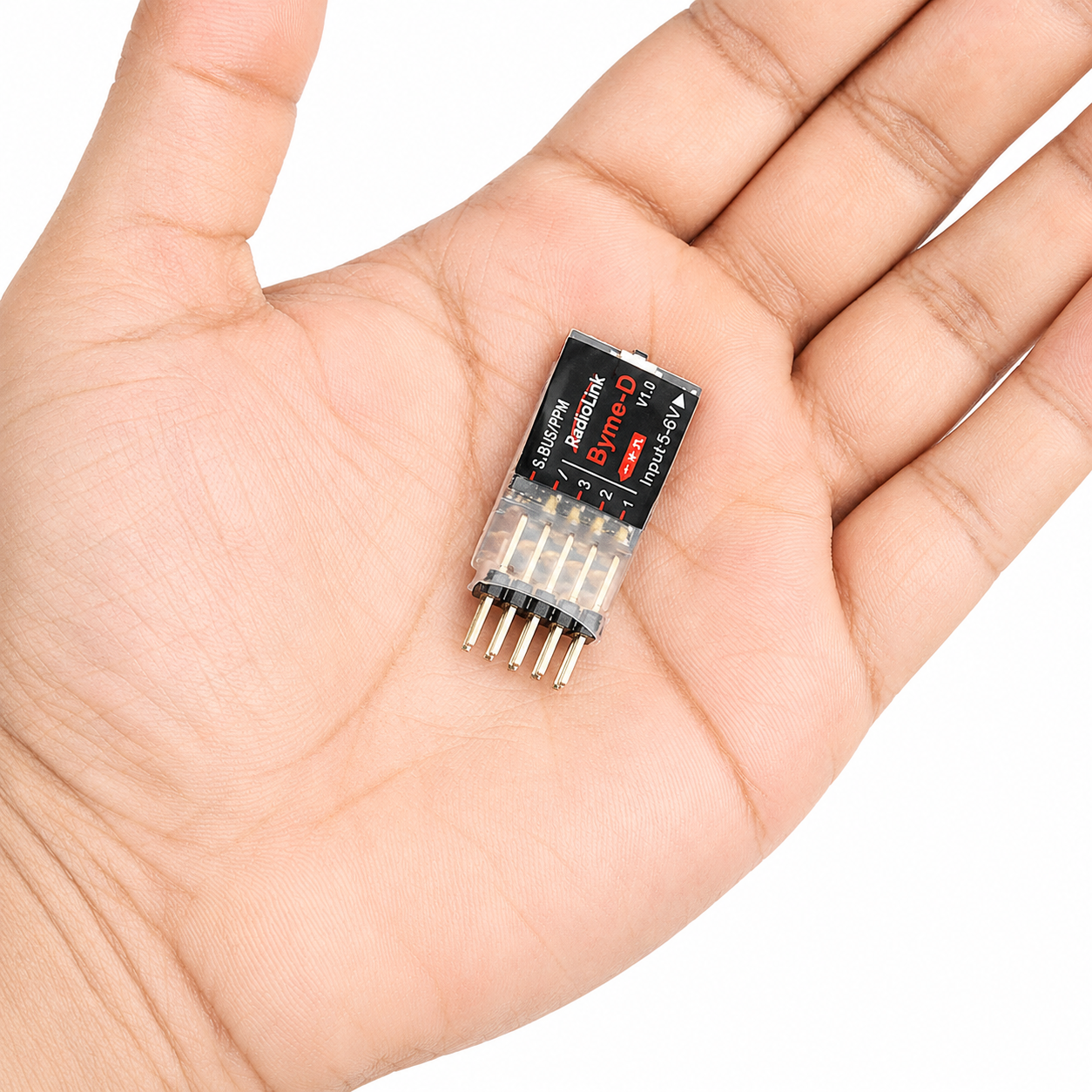 Radiolink Byme-D FC flight controller shown in hand
