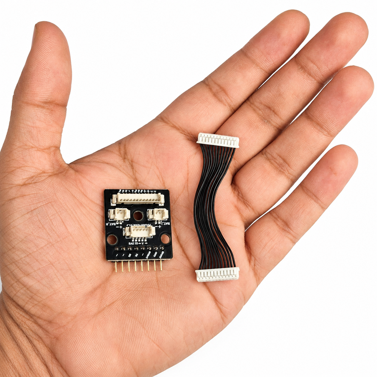 Radiomaster Pocket Connection Board shown in hand for size reference