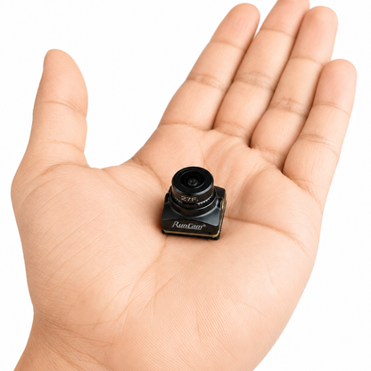 RunCam Phoenix 2 SPV5 FPV camera shown in hand for size comparison