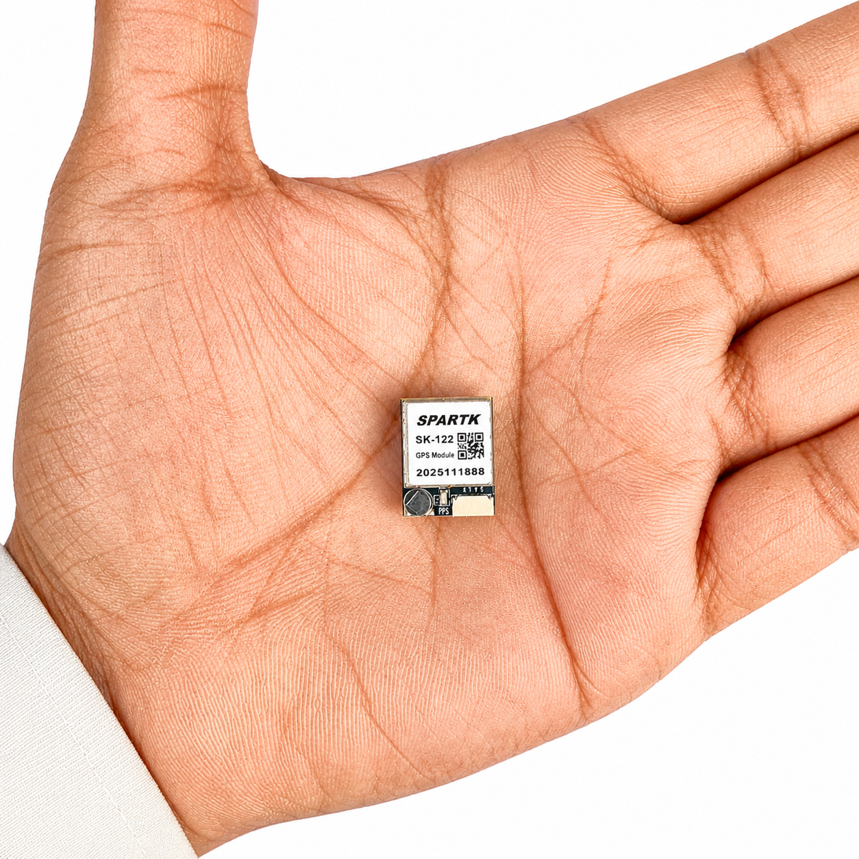 SPARTIK SK-122 Compact M10 GPS Module shown in hand for size reference, suitable for FPV drones and UAVs