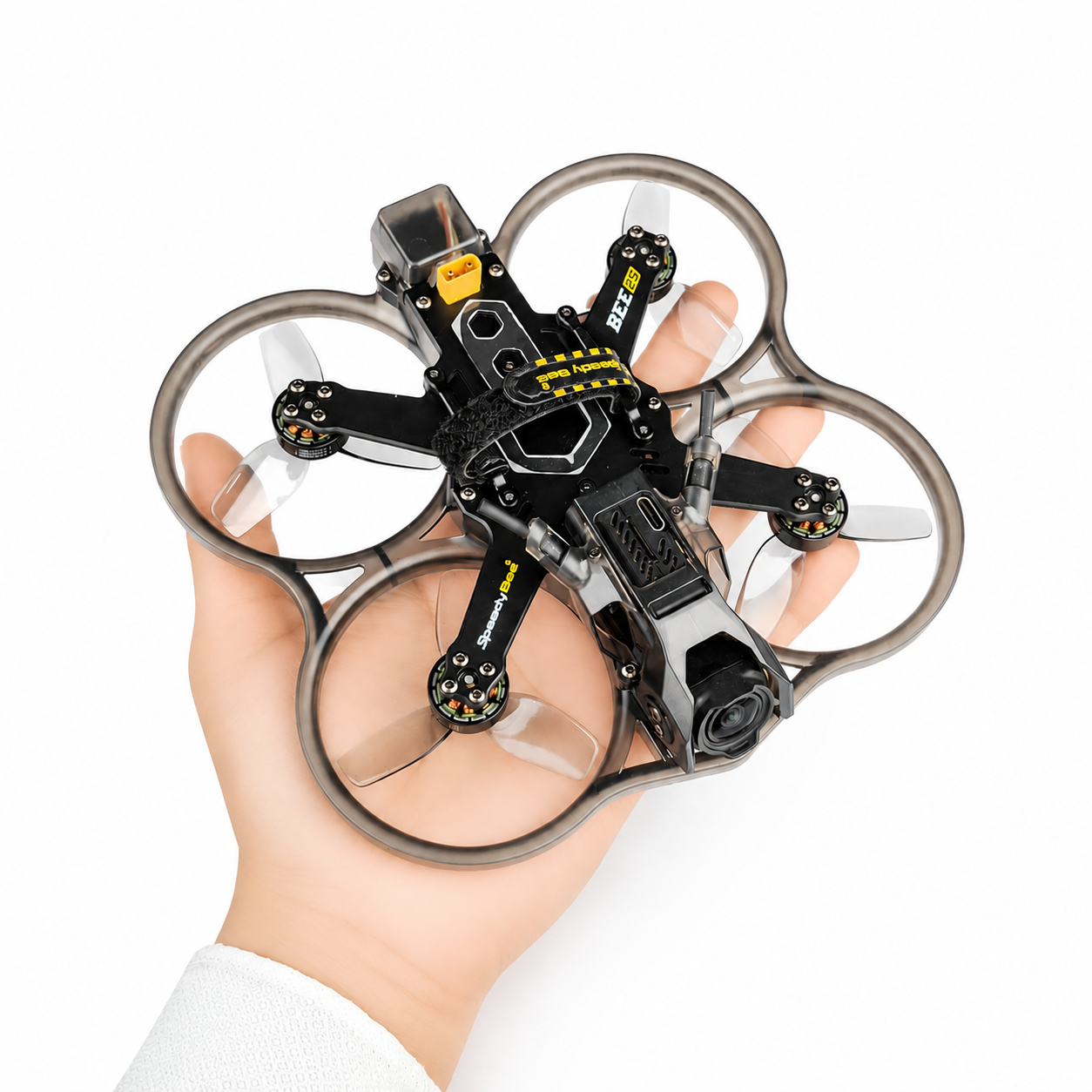 Hand holding SpeedyBee Bee25 2.5 Inch FPV drone
