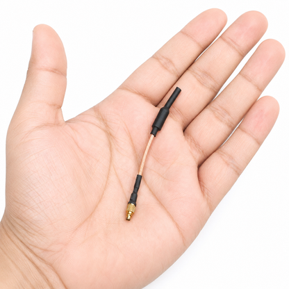 SpeedyBee MMCX Linear Antenna 75mm shown in hand for size reference
