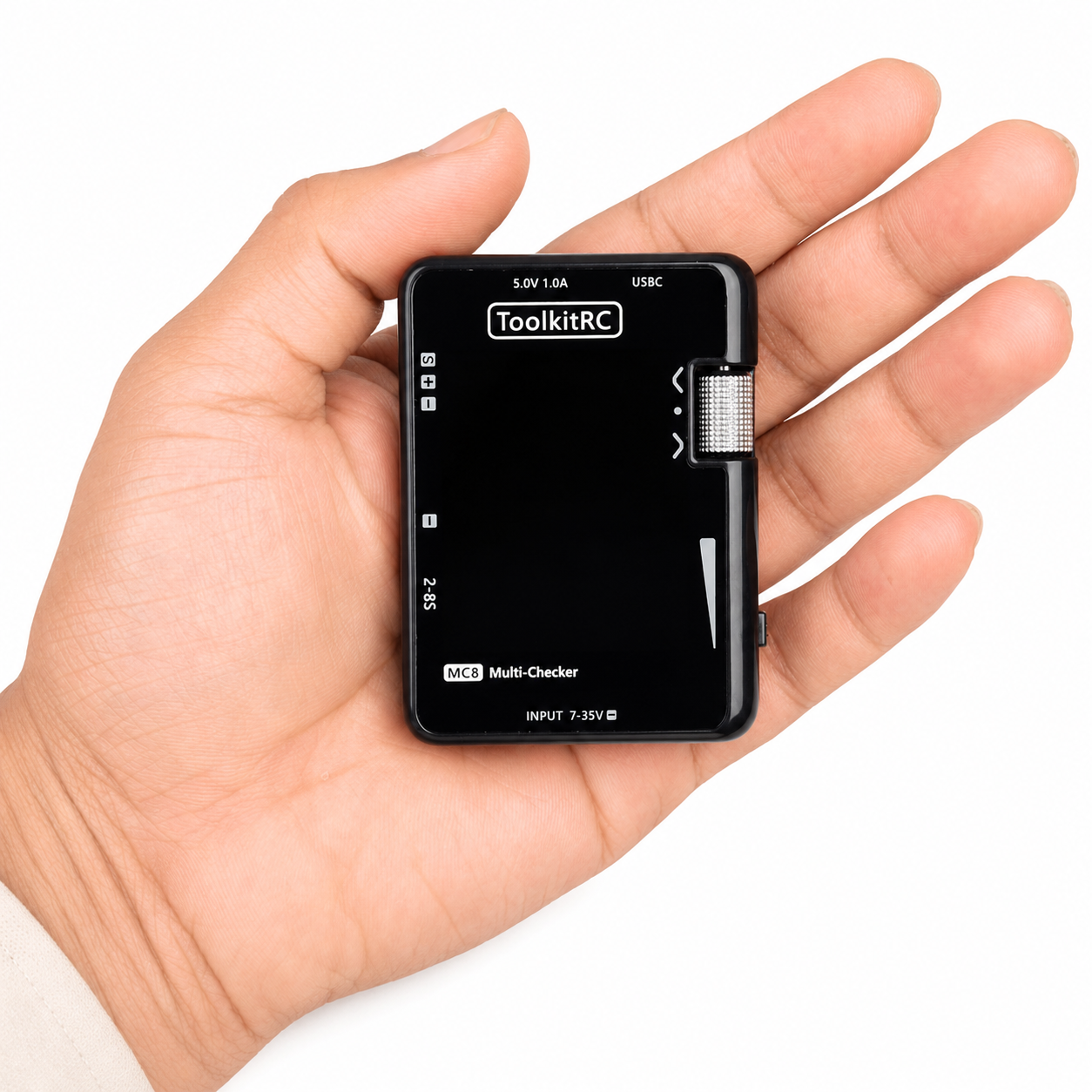 ToolkitRC MC8 compact battery checker shown in hand
