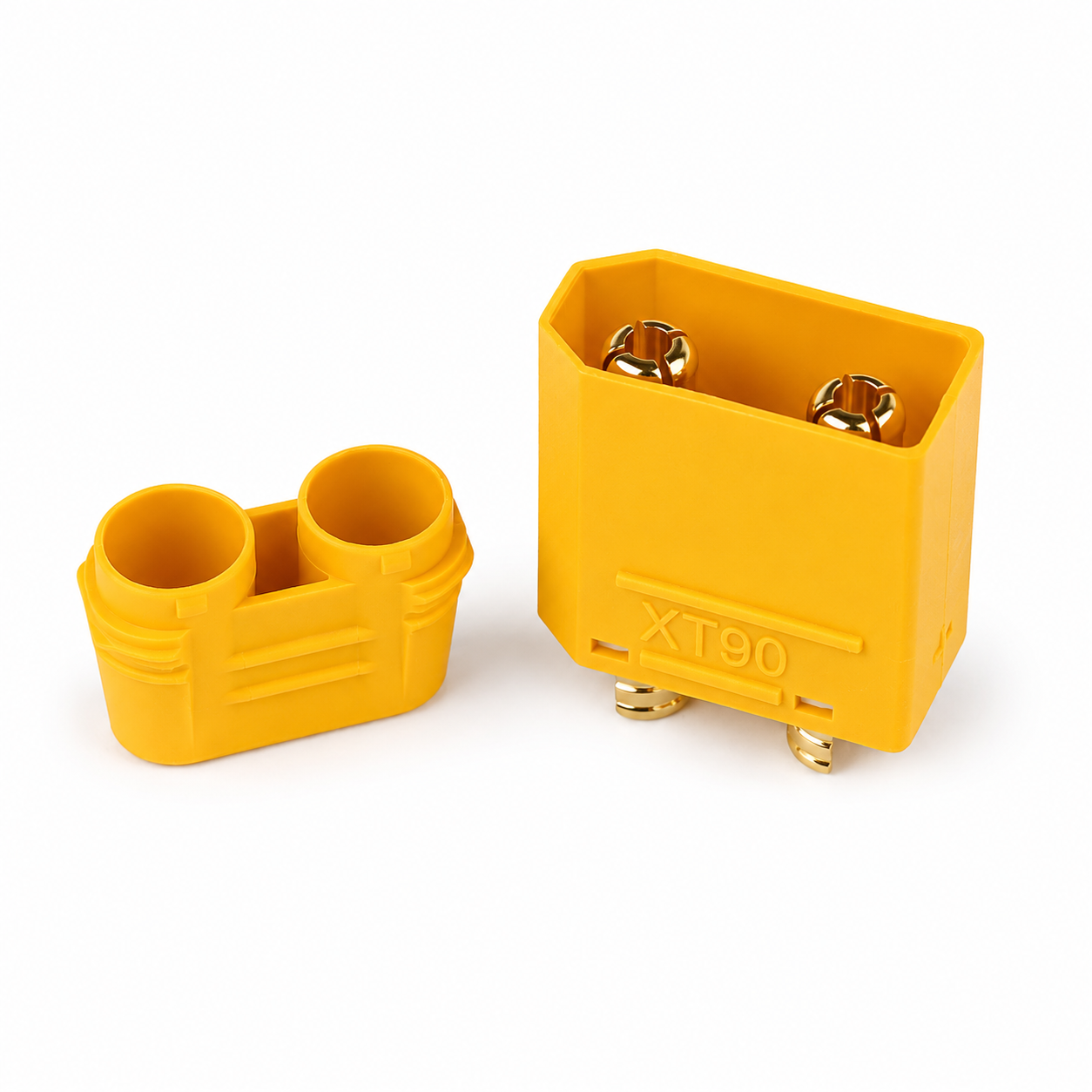Amass XT90H-M.G.Y male connector and housing cap for RC applications.
